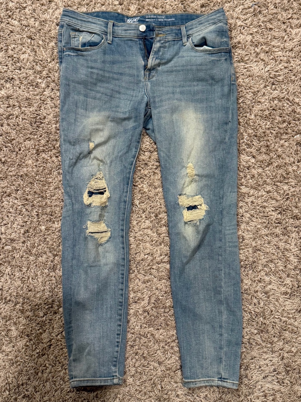 Ripped Mid-Rise Skinny Jeans